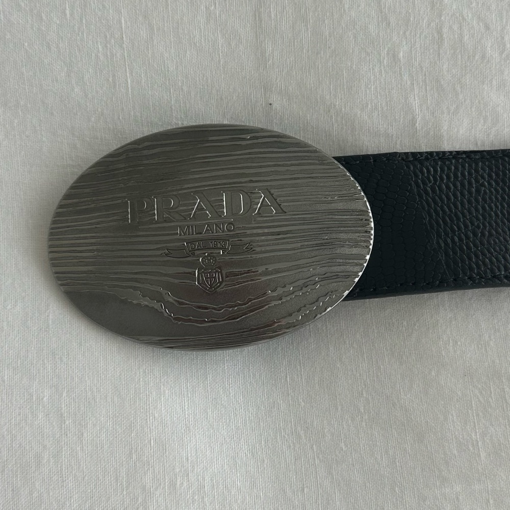 Prada Men’s Vintage black leather belt with silver oval buckle